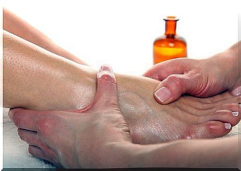 Moisturize cracked feet with baby oil.